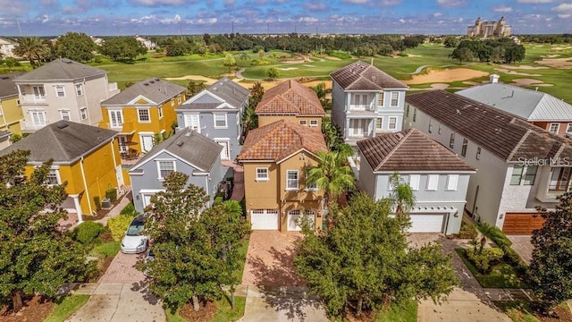 birds eye view of property featuring a residential view and golf course view