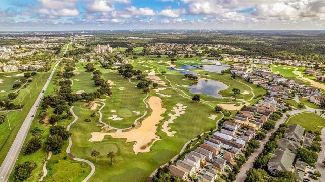 bird's eye view with a residential view and golf course view