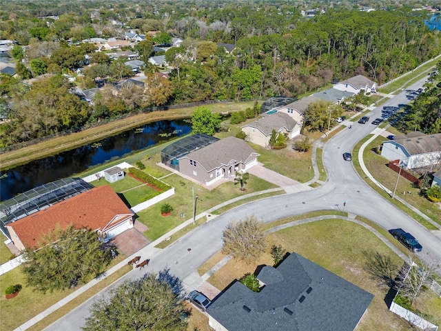 birds eye view of property featuring a residential view and a water view