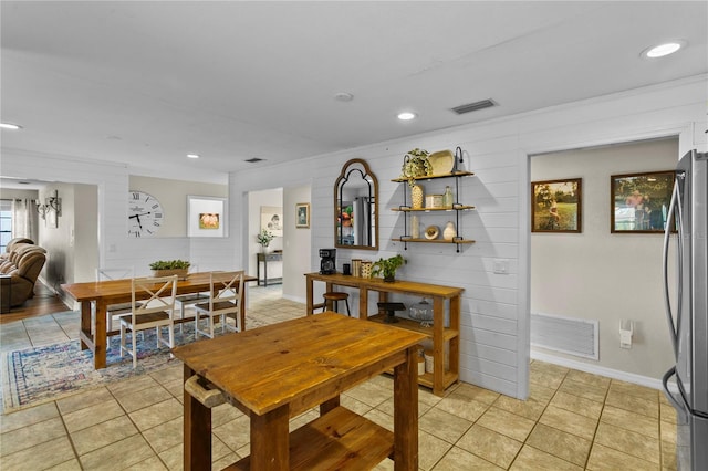 dining space with light tile patterned floors, visible vents, and recessed lighting