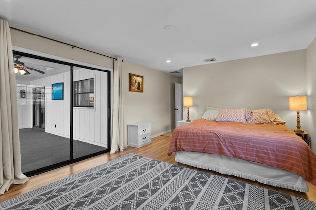 bedroom with baseboards, recessed lighting, visible vents, and light wood-type flooring