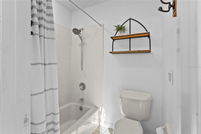 bathroom featuring toilet and shower / bath combo