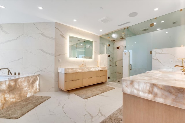 full bath with a marble finish shower, marble finish floor, and stone wall