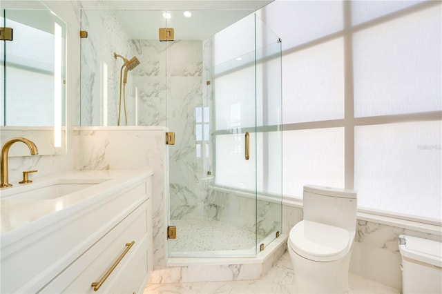 full bath featuring vanity, toilet, marble finish floor, and a marble finish shower