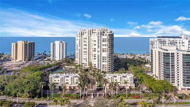 exterior space with a water view and a view of city