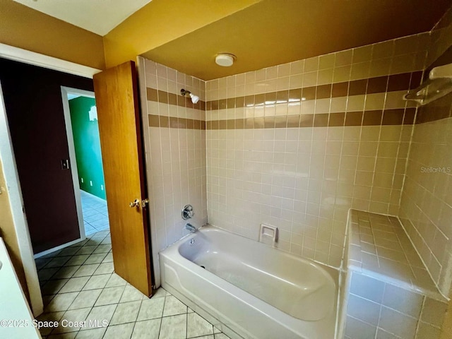 full bath with tile patterned floors and bathing tub / shower combination