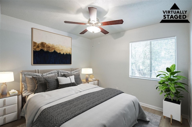 4605 Bayshore Dr Unit 6, Naples, FL 34112 - bedroom featuring wood finished floors and ceiling fan
