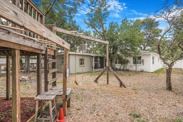 view of yard with a sunroom