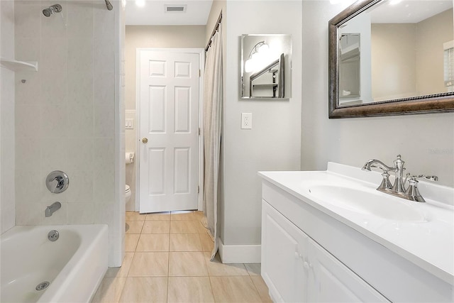 full bathroom with tile patterned floors, visible vents, toilet, shower / tub combo, and vanity