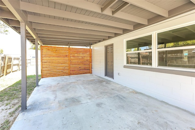 view of patio / terrace featuring fence