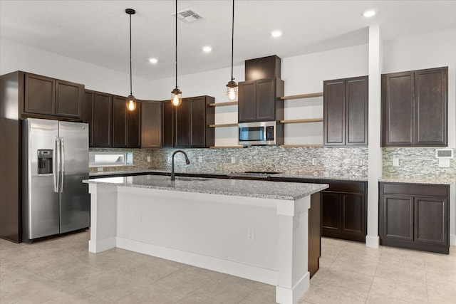 kitchen featuring open shelves, dark brown cabinets, appliances with stainless steel finishes, and a sink