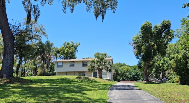 500 Forest Lake Dr, Altamonte Springs, FL 32714 - view of front of house with a front yard and driveway