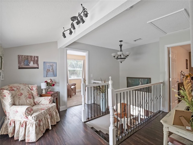 500 Forest Lake Dr, Altamonte Springs, FL 32714 - sitting room with wood finished floors, an upstairs landing, baseboards, and vaulted ceiling