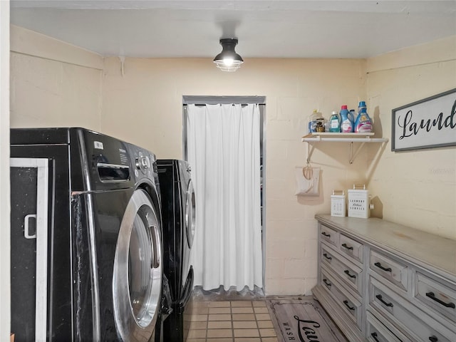 500 Forest Lake Dr, Altamonte Springs, FL 32714 - washroom featuring independent washer and dryer, concrete block wall, and light tile patterned flooring