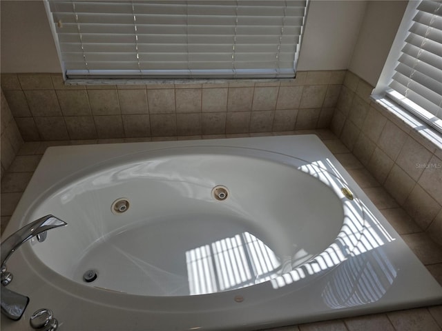 full bath featuring a whirlpool tub