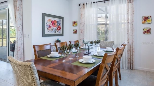 4507 Monado Dr, Kissimmee, FL 34746 - dining space with tile patterned floors and baseboards