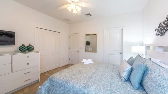 4507 Monado Dr, Kissimmee, FL 34746 - bedroom featuring a closet, visible vents, light carpet, and ceiling fan