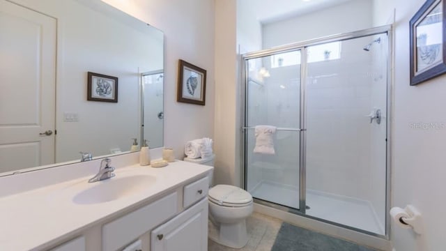 4507 Monado Dr, Kissimmee, FL 34746 - bathroom featuring a stall shower, toilet, and vanity