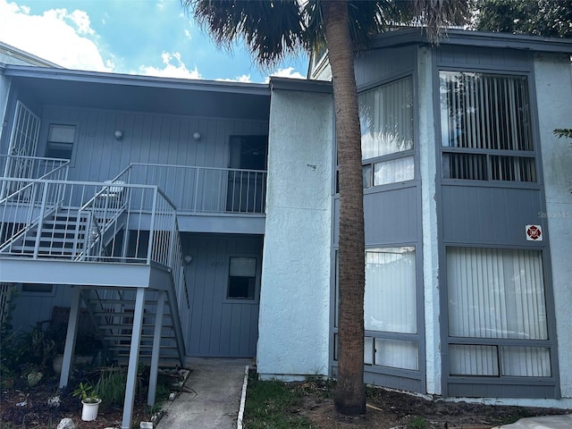 view of building exterior featuring stairs