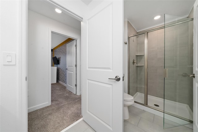 full bathroom with tile patterned flooring, recessed lighting, a shower stall, and toilet