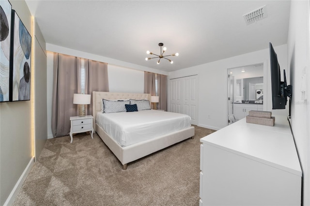 bedroom with visible vents, a notable chandelier, a closet, baseboards, and light colored carpet