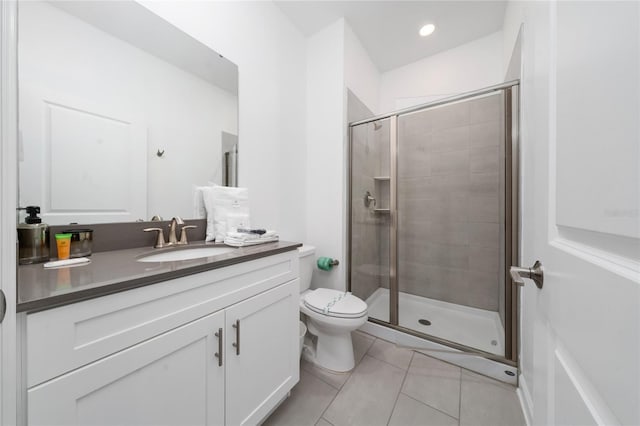 full bath with vanity, recessed lighting, a stall shower, tile patterned floors, and toilet