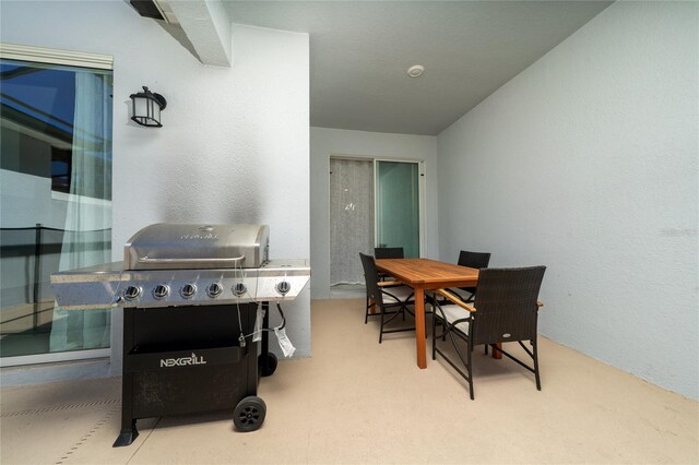 view of patio / terrace featuring outdoor dining area and area for grilling