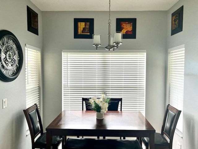 dining room with a chandelier