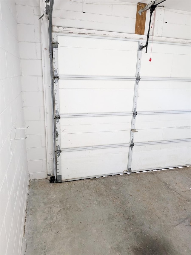 garage featuring concrete block wall