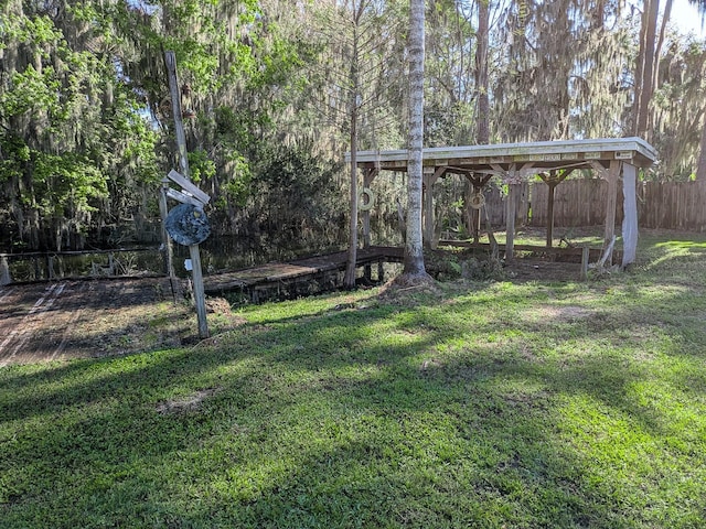 view of yard with fence