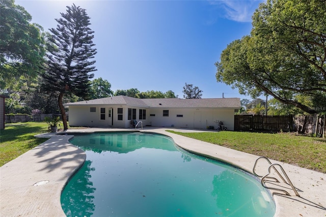 view of pool featuring a fenced backyard, a lawn, a patio, and a fenced in pool