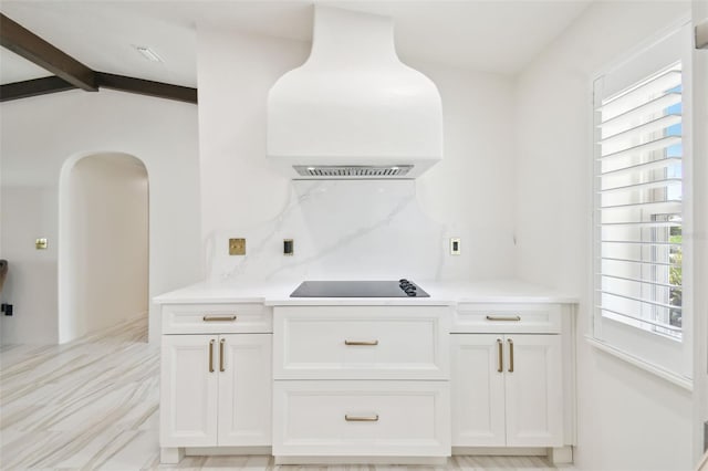 bar with range hood, beamed ceiling, arched walkways, black electric stovetop, and backsplash