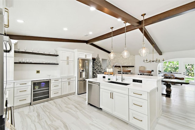 kitchen featuring vaulted ceiling with beams, a sink, stainless steel appliances, light countertops, and wine cooler