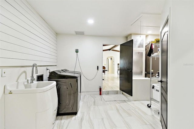 laundry room featuring visible vents, recessed lighting, separate washer and dryer, attic access, and laundry area