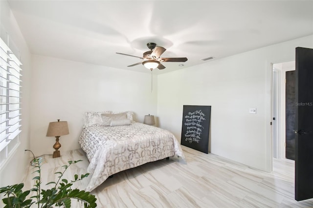 bedroom with visible vents and ceiling fan