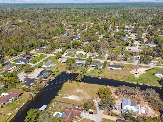 drone / aerial view with a residential view and a water view