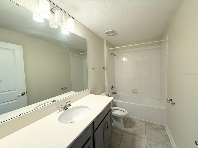 full bath featuring tile patterned flooring, visible vents, toilet, vanity, and a textured ceiling