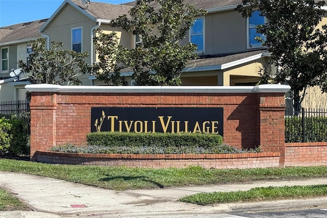 community sign with fence