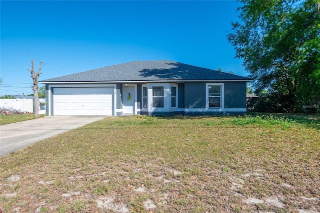 single story home with stucco siding, a front lawn, fence, concrete driveway, and a garage