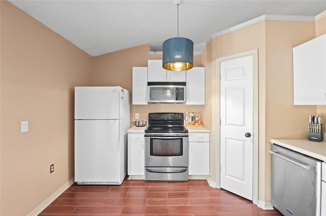 kitchen featuring wood finish floors, stainless steel appliances, white cabinets, and light countertops