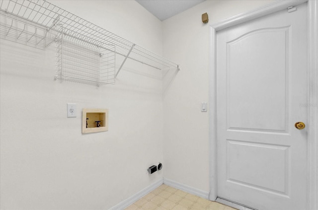 clothes washing area featuring baseboards, light floors, laundry area, hookup for a washing machine, and electric dryer hookup