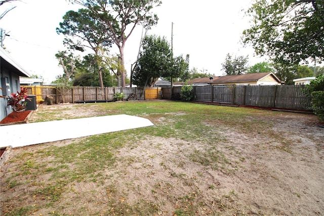 view of yard featuring a fenced backyard