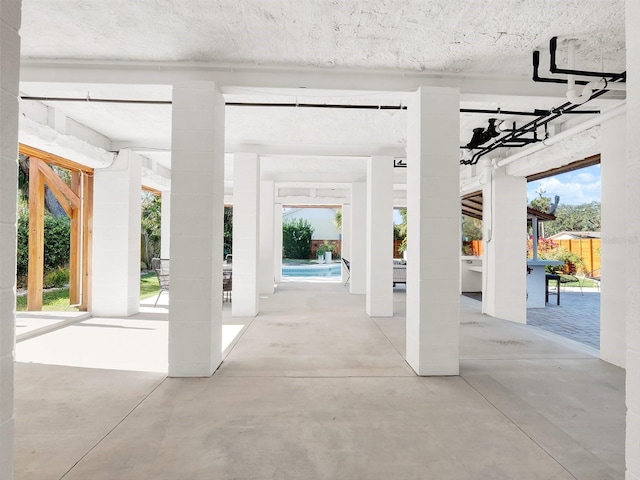 view of patio with an outdoor pool and outdoor dining space