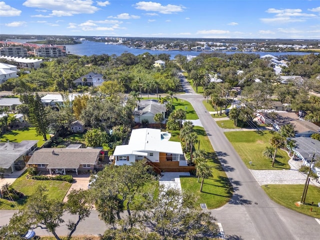 drone / aerial view with a water view