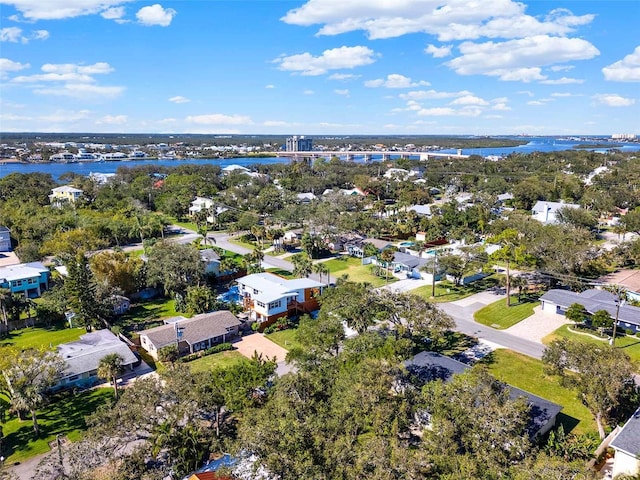 bird's eye view with a residential view and a water view