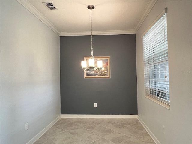 empty room featuring crown molding, baseboards, and visible vents