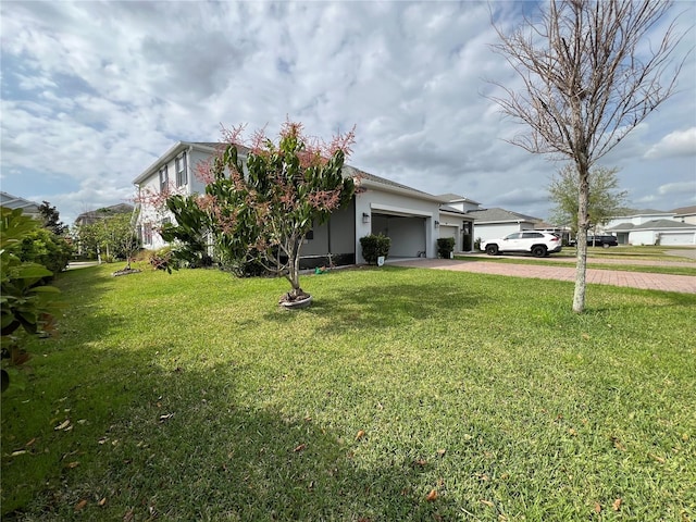 exterior space featuring decorative driveway and a garage