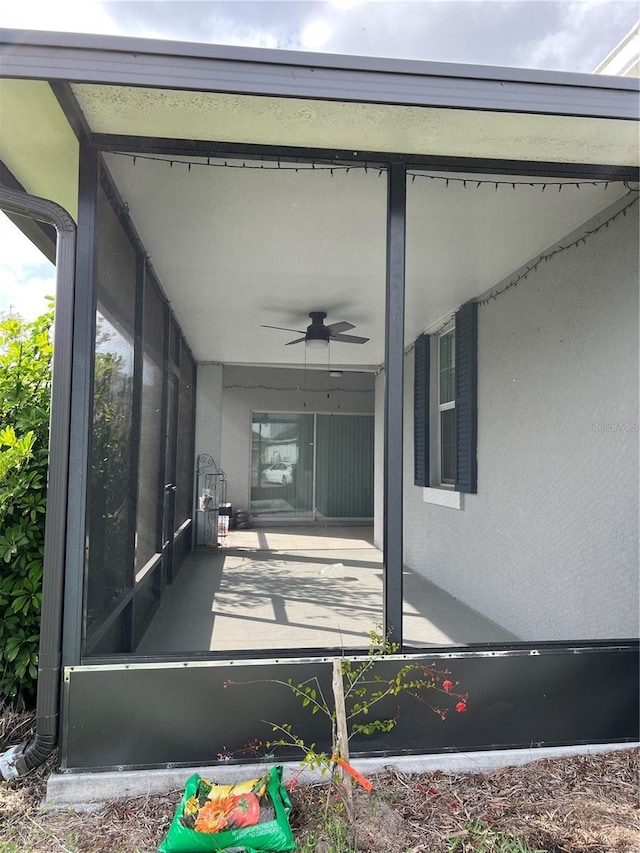 view of patio / terrace featuring ceiling fan