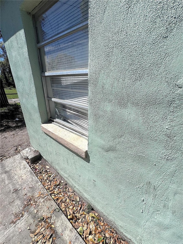 details featuring stucco siding