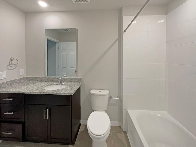 bathroom with vanity, baseboards, visible vents, shower / bathing tub combination, and toilet